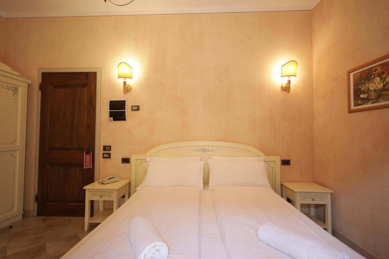 Hotel Il Portico By Lvg Hotel Collection Канобио Екстериор снимка