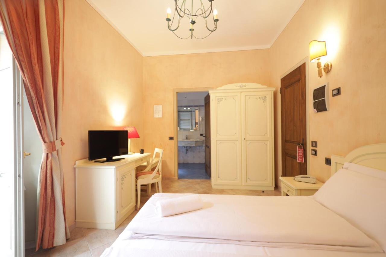 Hotel Il Portico By Lvg Hotel Collection Канобио Екстериор снимка