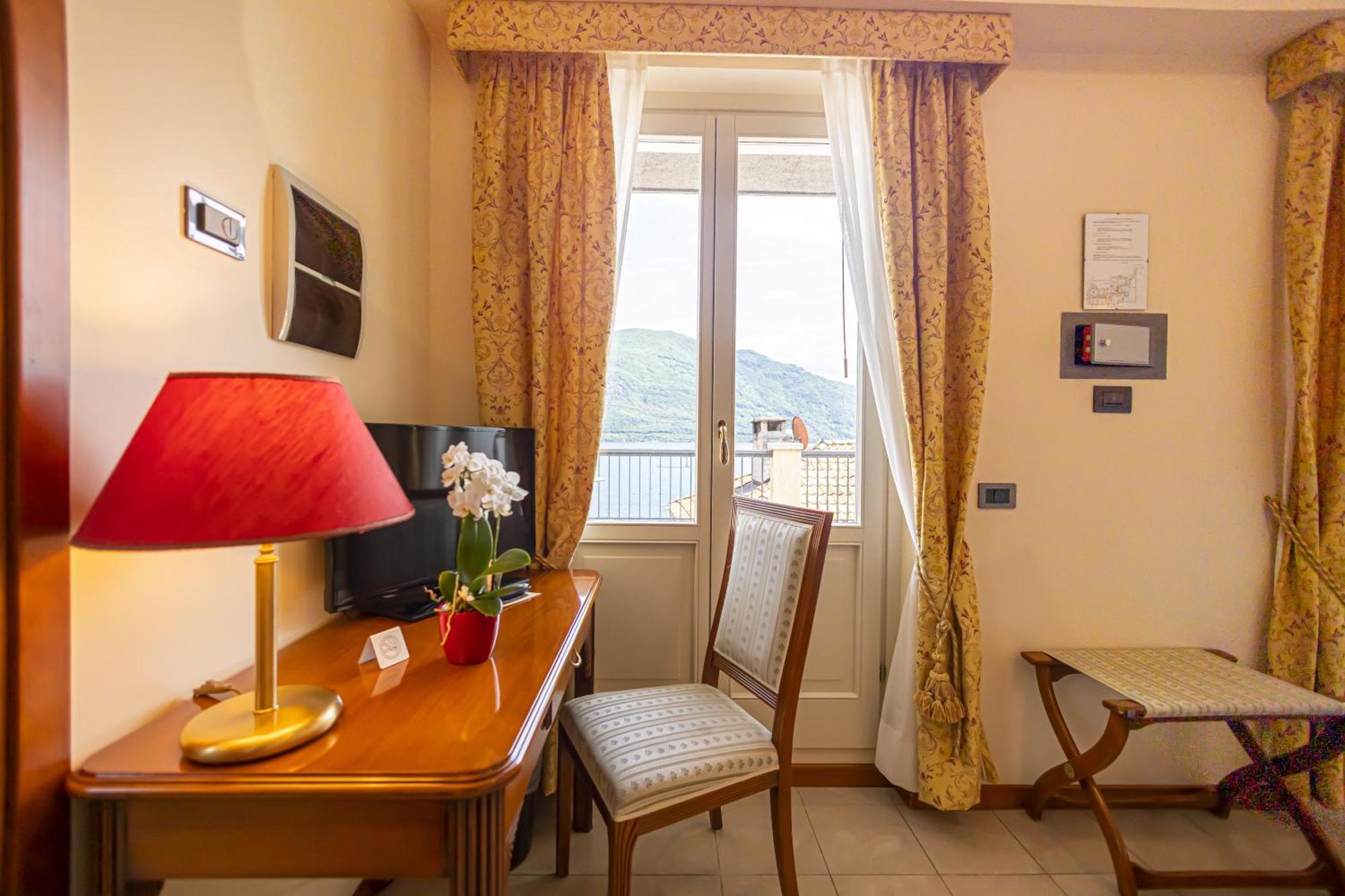 Hotel Il Portico By Lvg Hotel Collection Канобио Стая снимка